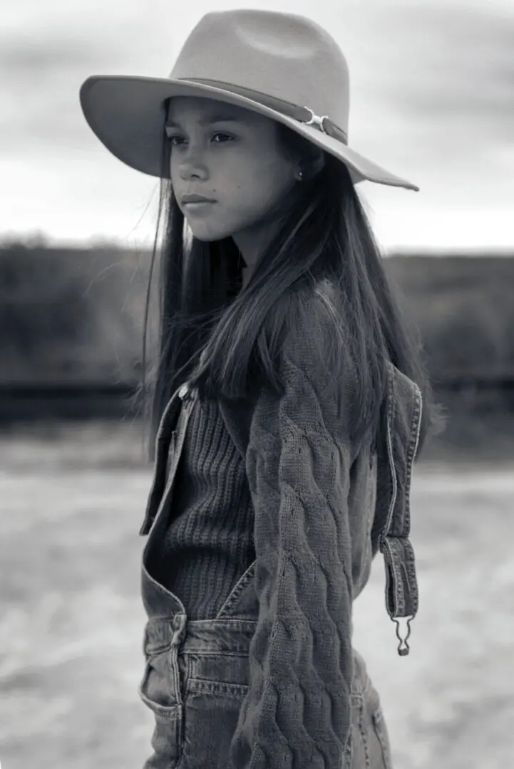Caroline Quinn wearing a cowboy hat