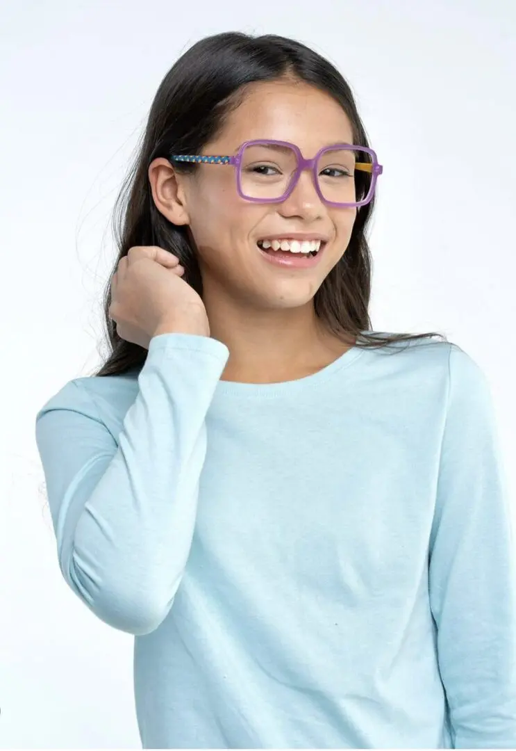 Teenage girl wearing square glasses